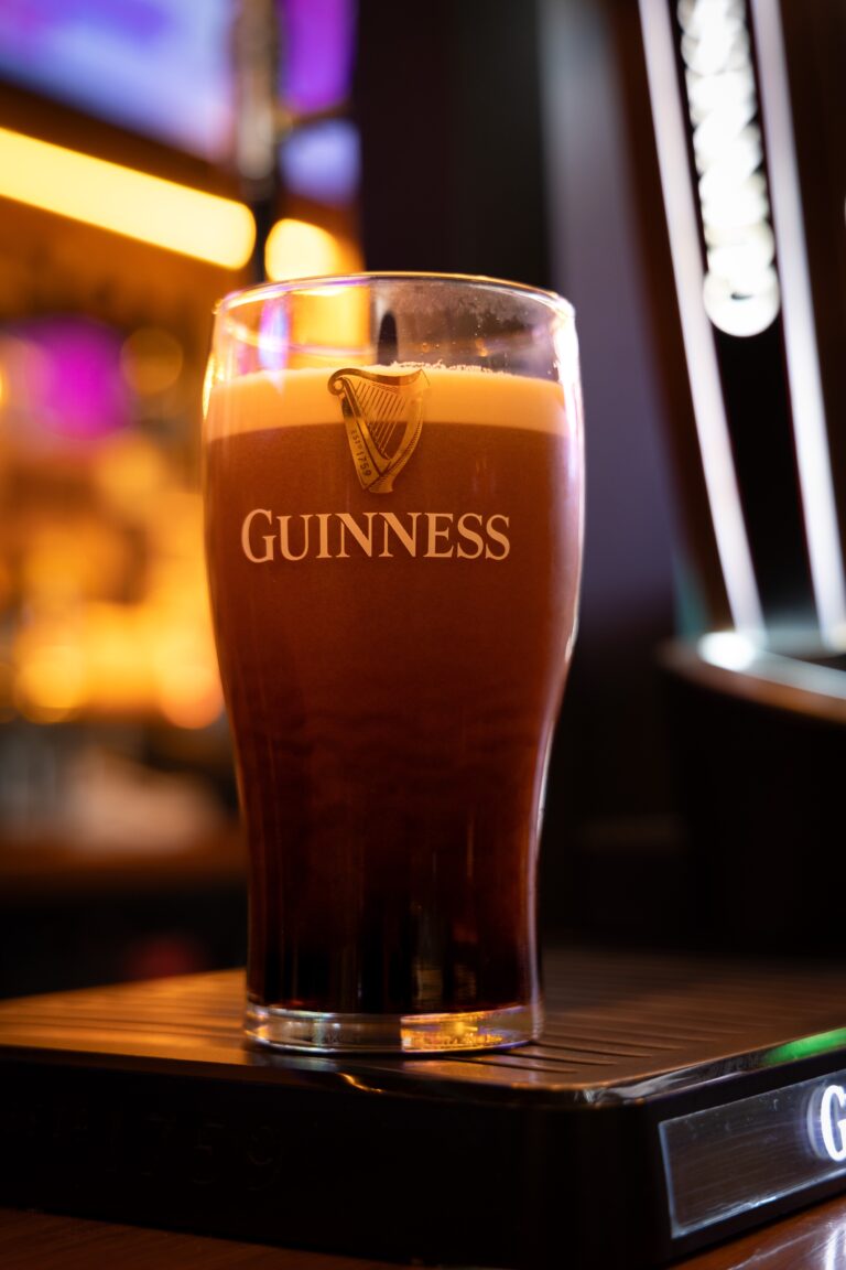 Pint of Guinness on pub bar counter