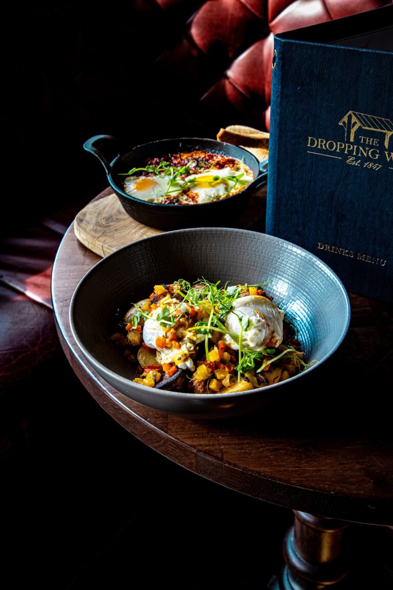 Brunch dishes with poached eggs and baked eggs