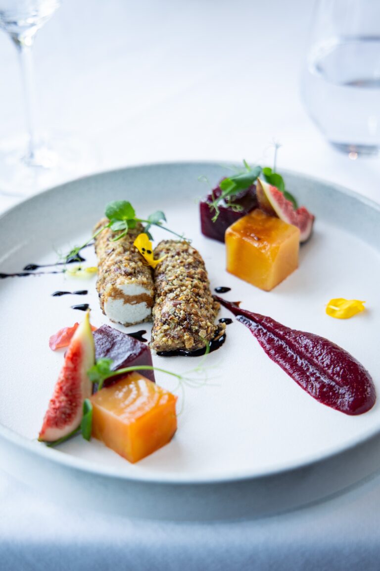 Nut-crusted goat cheese with beetroot purée and figs